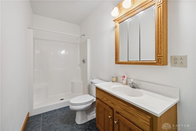 4384 New Market Banta Rd, Lewisburg, OH 45338 - full bath featuring a shower, vanity, toilet, and tile patterned flooring