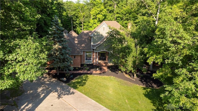 4384 New Market Banta Rd, Lewisburg, OH 45338 - aerial view of property and surrounding area with a heavily wooded area