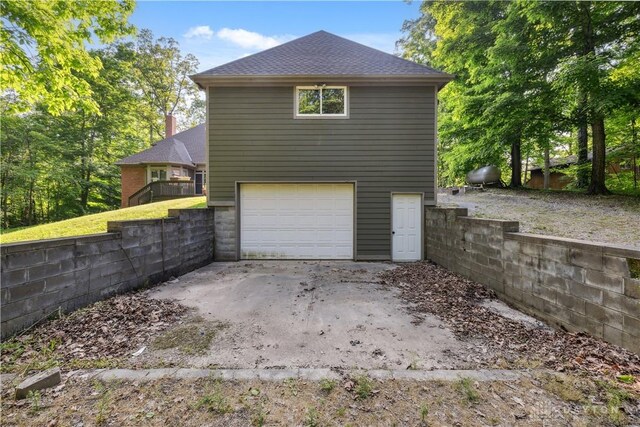 4384 New Market Banta Rd, Lewisburg, OH 45338 - view of home's exterior featuring concrete driveway, roof with shingles, and an attached garage