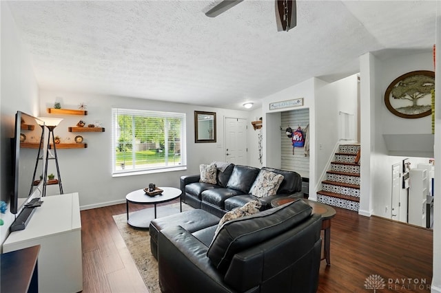 9675 Pellston Way, Miamisburg, OH 45342 - living area with a textured ceiling, stairway, dark wood-type flooring, ceiling fan, and baseboards