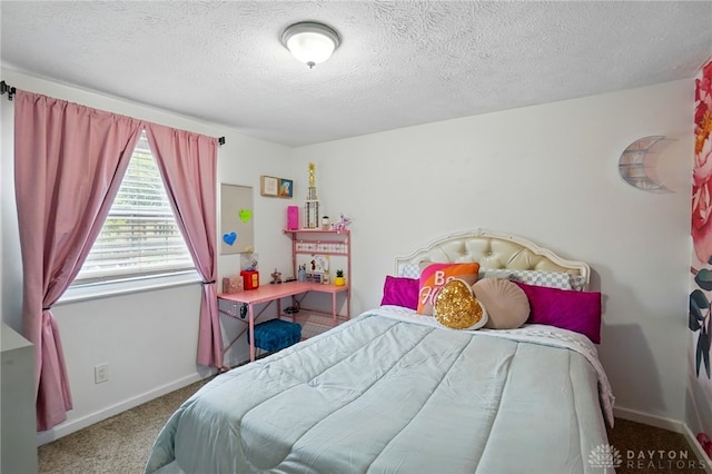 9675 Pellston Way, Miamisburg, OH 45342 - bedroom with carpet flooring, baseboards, and a textured ceiling