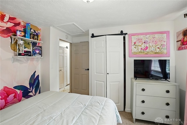 9675 Pellston Way, Miamisburg, OH 45342 - carpeted bedroom with a closet, attic access, and a textured ceiling