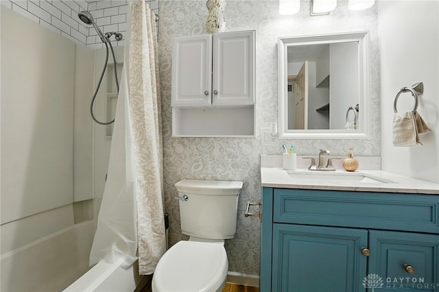 9675 Pellston Way, Miamisburg, OH 45342 - full bath with vanity, toilet, shower / bath combo with shower curtain, and wallpapered walls