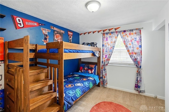 9675 Pellston Way, Miamisburg, OH 45342 - bedroom with carpet flooring, a textured ceiling, and baseboards