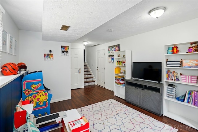 9675 Pellston Way, Miamisburg, OH 45342 - recreation room with wood finished floors and a textured ceiling