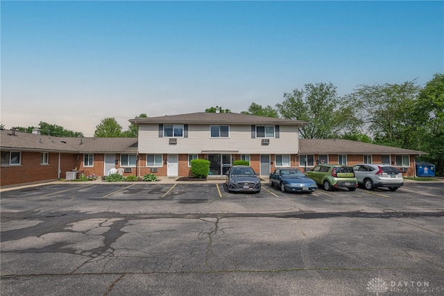 2648 Parklawn Dr, Kettering, OH 45440 - multi unit property featuring uncovered parking, brick siding, and cooling unit