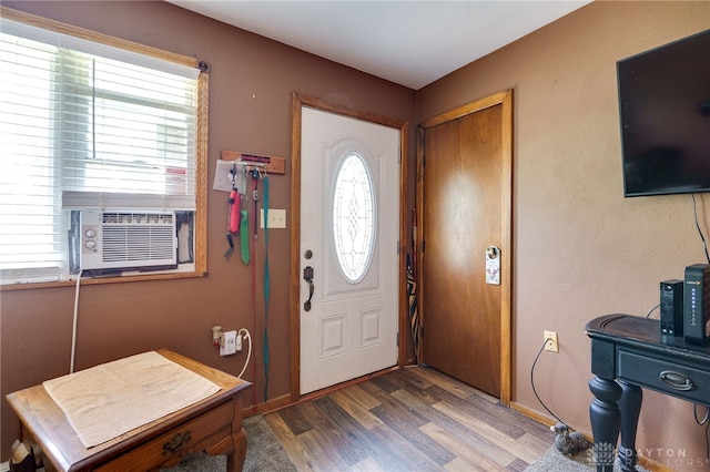 3726 Shawnee Trl, New Jasper Twp, OH 45335 - entrance foyer featuring wood finished floors and cooling unit