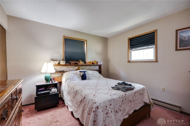 3726 Shawnee Trl, New Jasper Twp, OH 45335 - bedroom with a baseboard heating unit, light carpet, and baseboards