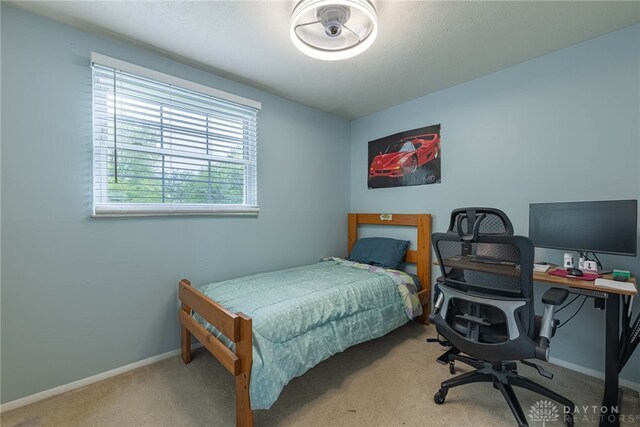 2547 Ryan Ct, Beavercreek, OH 45434 - bedroom featuring a desk, carpet, and baseboards