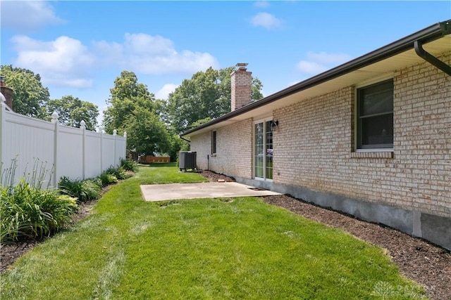 560 Roselake Dr, Centerville, OH 45458 - view of yard featuring central air condition unit and a patio