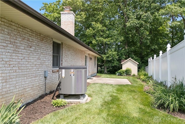 560 Roselake Dr, Centerville, OH 45458 - view of yard with central AC and a patio area