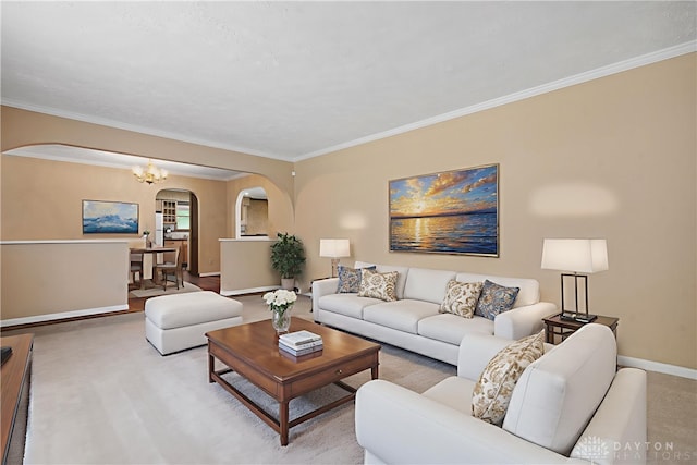 560 Roselake Dr, Centerville, OH 45458 - living area with arched walkways, baseboards, ornamental molding, and a chandelier