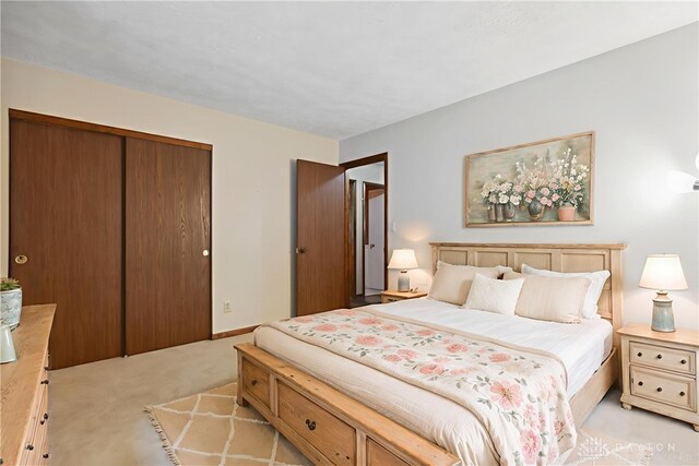 560 Roselake Dr, Centerville, OH 45458 - bedroom with light carpet and a closet
