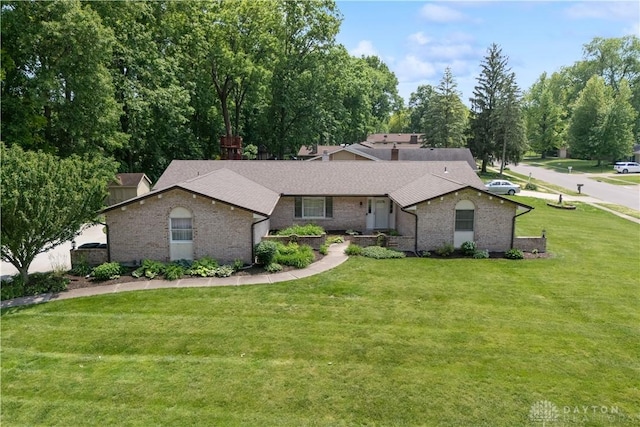 560 Roselake Dr, Centerville, OH 45458 - ranch-style home featuring a front lawn, brick siding, and a shingled roof