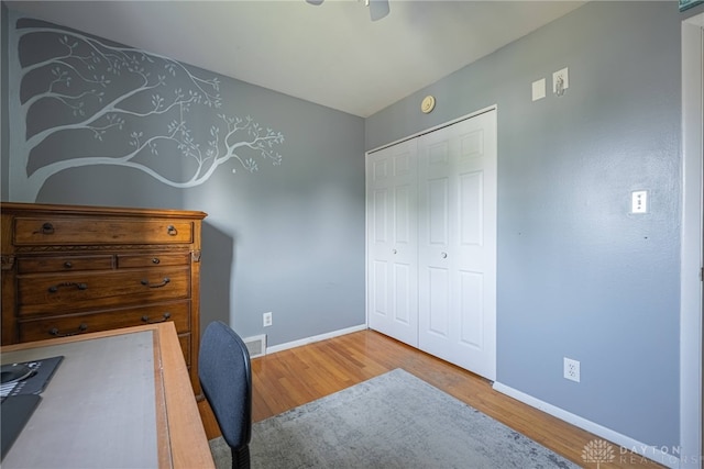 460 Rader Dr, Vandalia, OH 45377 - office area with wood finished floors, baseboards, and ceiling fan