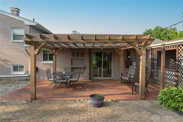 460 Rader Dr, Vandalia, OH 45377 - rear view of property with a pergola, a patio, and brick siding
