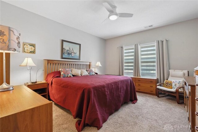 1215 Bourdeaux Way, Clearcreek Twp, OH 45458 - bedroom featuring light carpet and ceiling fan