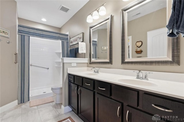 1215 Bourdeaux Way, Clearcreek Twp, OH 45458 - bathroom featuring marble finish flooring, toilet, double vanity, a shower stall, and baseboards