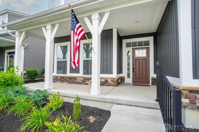 5053 Maiden Way, Liberty Twp, OH 45011 - entrance to property featuring covered porch and stone siding