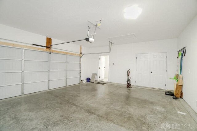 5053 Maiden Way, Liberty Twp, OH 45011 - garage featuring a garage door opener