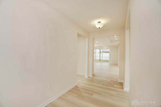 5053 Maiden Way, Liberty Twp, OH 45011 - corridor featuring light wood-style flooring and baseboards