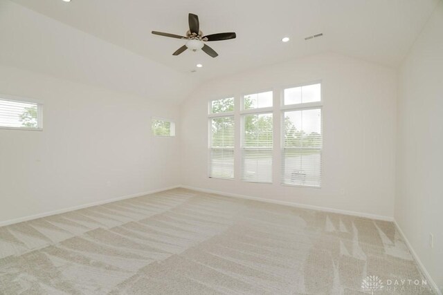 5053 Maiden Way, Liberty Twp, OH 45011 - spare room featuring lofted ceiling, healthy amount of natural light, light carpet, baseboards, and recessed lighting