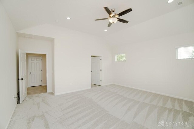 5053 Maiden Way, Liberty Twp, OH 45011 - spare room with light carpet, vaulted ceiling, ceiling fan, healthy amount of natural light, and baseboards