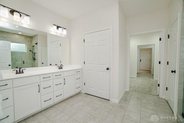 5053 Maiden Way, Liberty Twp, OH 45011 - bathroom with a stall shower, double vanity, tile patterned flooring, and baseboards