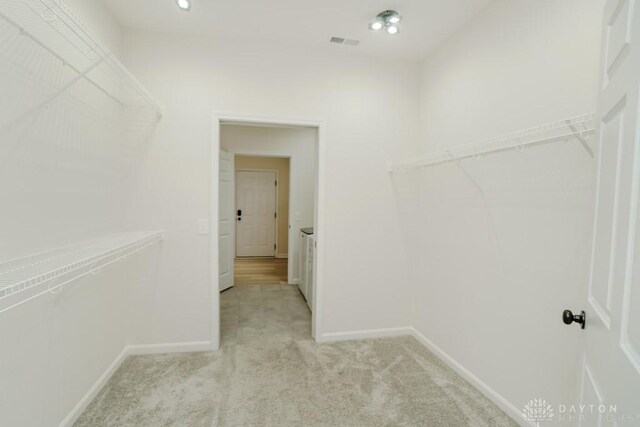 5053 Maiden Way, Liberty Twp, OH 45011 - walk in closet featuring light colored carpet
