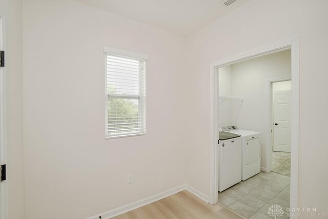 5053 Maiden Way, Liberty Twp, OH 45011 - washroom featuring washer and dryer and baseboards