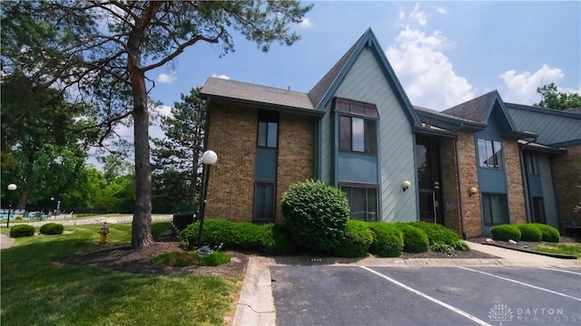 1918 Washington Dr S, Washington Twp, OH 45458 - view of building exterior with uncovered parking