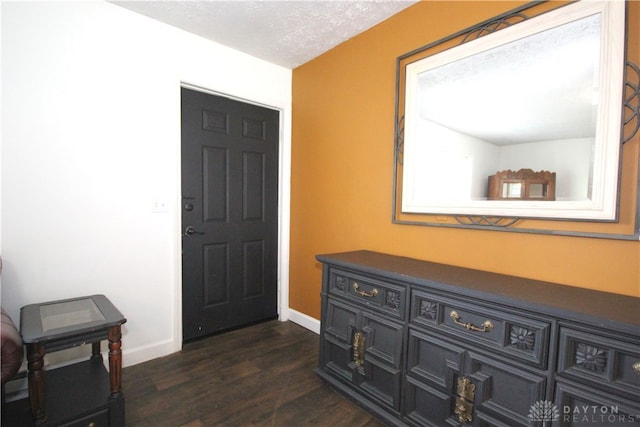 6959 Edenton Pleasant Plain Rd, Wayne Twp, OH 45162 - entrance foyer with dark wood-style floors and baseboards