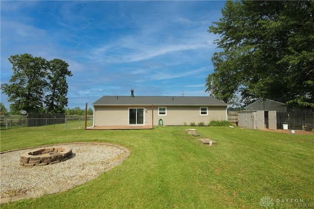 6959 Edenton Pleasant Plain Rd, Wayne Twp, OH 45162 - rear view of property featuring an outdoor fire pit and a deck