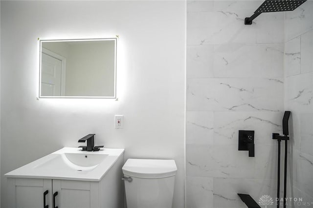 4612 Ward St, Cincinnati, OH 45227 - bathroom with vanity, toilet, and a tile shower