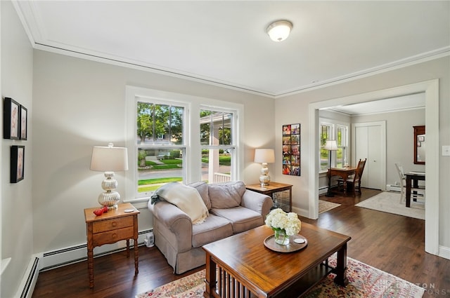 27 Spirea Dr, Oakwood, OH 45419 - living area with crown molding, dark wood-type flooring, baseboards, and baseboard heating