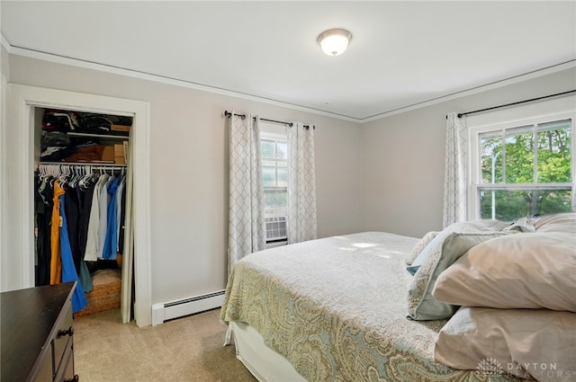 27 Spirea Dr, Oakwood, OH 45419 - bedroom featuring a baseboard radiator, carpet, ornamental molding, a closet, and a walk in closet