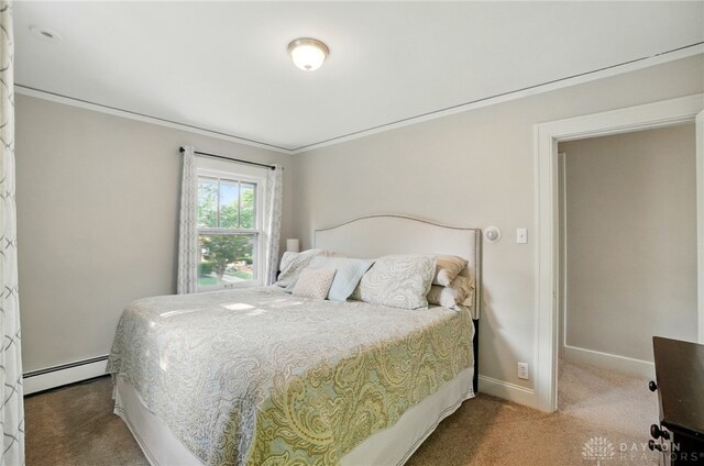 27 Spirea Dr, Oakwood, OH 45419 - bedroom with a baseboard radiator, carpet, crown molding, and baseboards