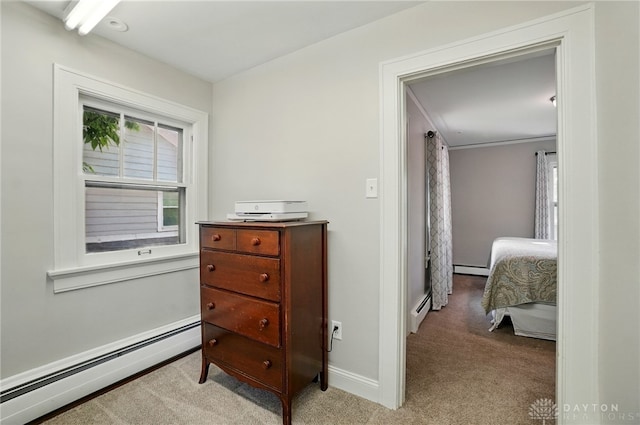 27 Spirea Dr, Oakwood, OH 45419 - bedroom featuring a baseboard radiator, light colored carpet, and baseboards