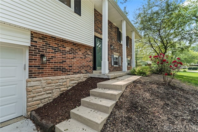 340 Marsha Jeanne Way, Dayton, OH 45458 - view of exterior entry featuring brick siding and covered porch