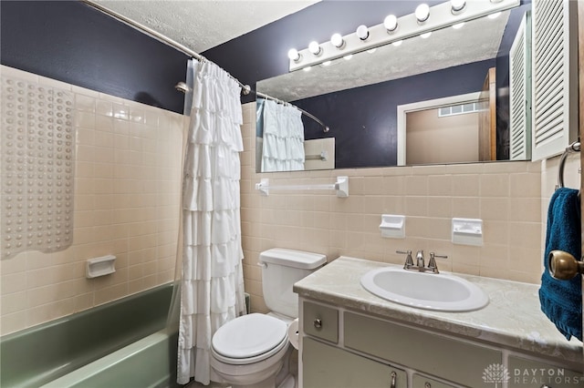 340 Marsha Jeanne Way, Dayton, OH 45458 - full bath with shower / bath combo with shower curtain, vanity, toilet, and tile walls