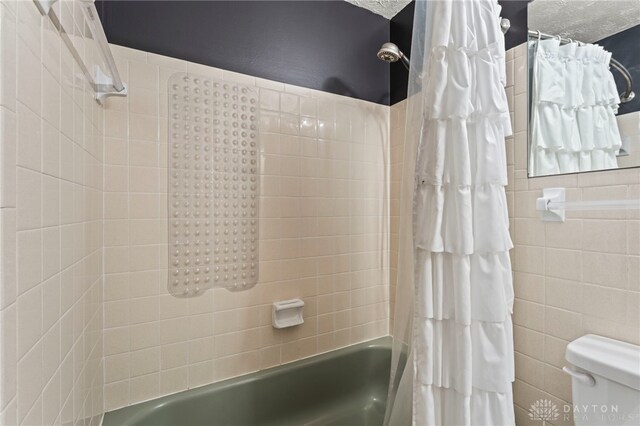 340 Marsha Jeanne Way, Dayton, OH 45458 - full bath featuring shower / bath combo with shower curtain and toilet