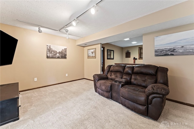 340 Marsha Jeanne Way, Dayton, OH 45458 - living room with track lighting, carpet, baseboards, and a textured ceiling