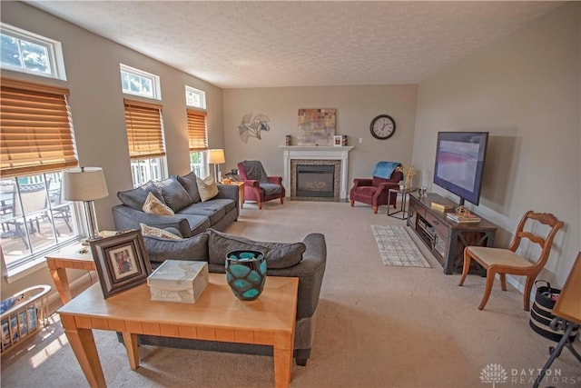 4560 James Madison Trl, Kettering, OH 45440 - living room featuring carpet, a fireplace with flush hearth, and a textured ceiling