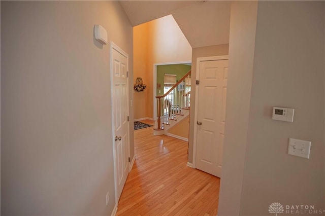 4560 James Madison Trl, Kettering, OH 45440 - corridor featuring light wood finished floors, stairway, and baseboards