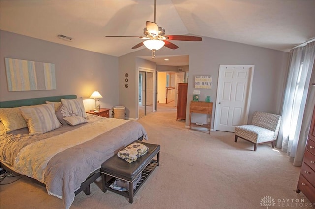 4560 James Madison Trl, Kettering, OH 45440 - bedroom featuring light colored carpet, lofted ceiling, and a ceiling fan