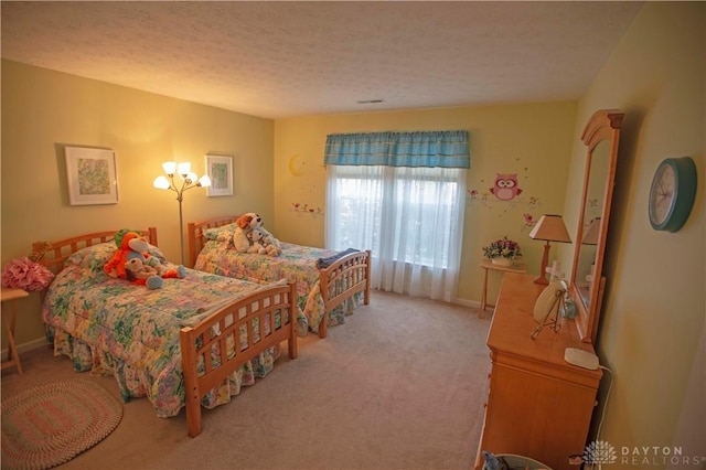 4560 James Madison Trl, Kettering, OH 45440 - carpeted bedroom featuring a textured ceiling