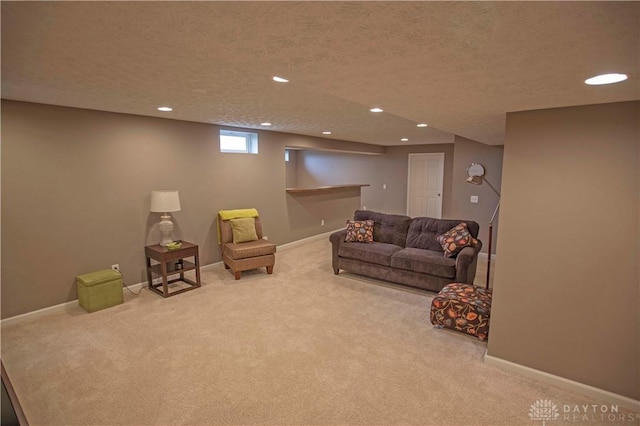 4560 James Madison Trl, Kettering, OH 45440 - living room featuring carpet, recessed lighting, baseboards, and a textured ceiling