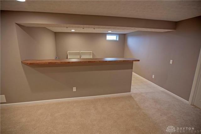4560 James Madison Trl, Kettering, OH 45440 - indoor dry bar featuring carpet, recessed lighting, a textured ceiling, and baseboards