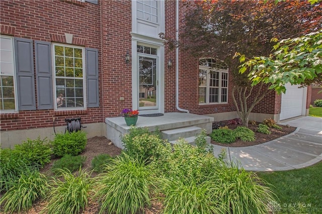 4560 James Madison Trl, Kettering, OH 45440 - entrance to property with brick siding and a garage
