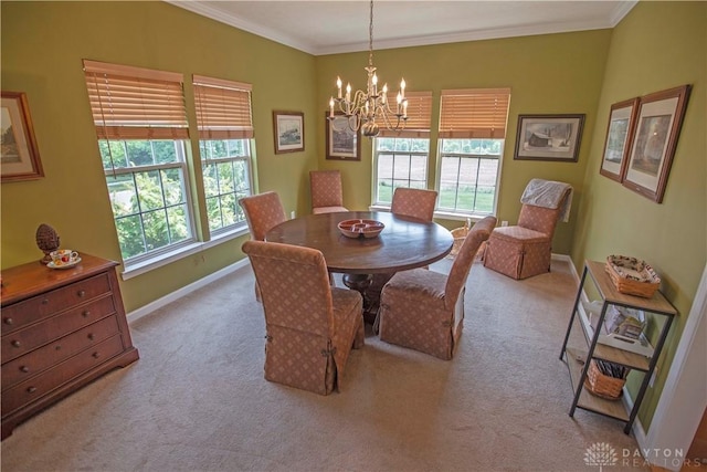 4560 James Madison Trl, Kettering, OH 45440 - carpeted dining space with a chandelier, crown molding, and baseboards